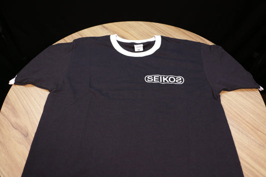 Seikos samarreta blanca i negra logo